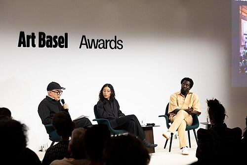 Hans Ulrich Obrist, Lydia Ourahmane, and Ibrahim Mahama at the Art Basel international art fair in Basel, Switzerland in June 2025.