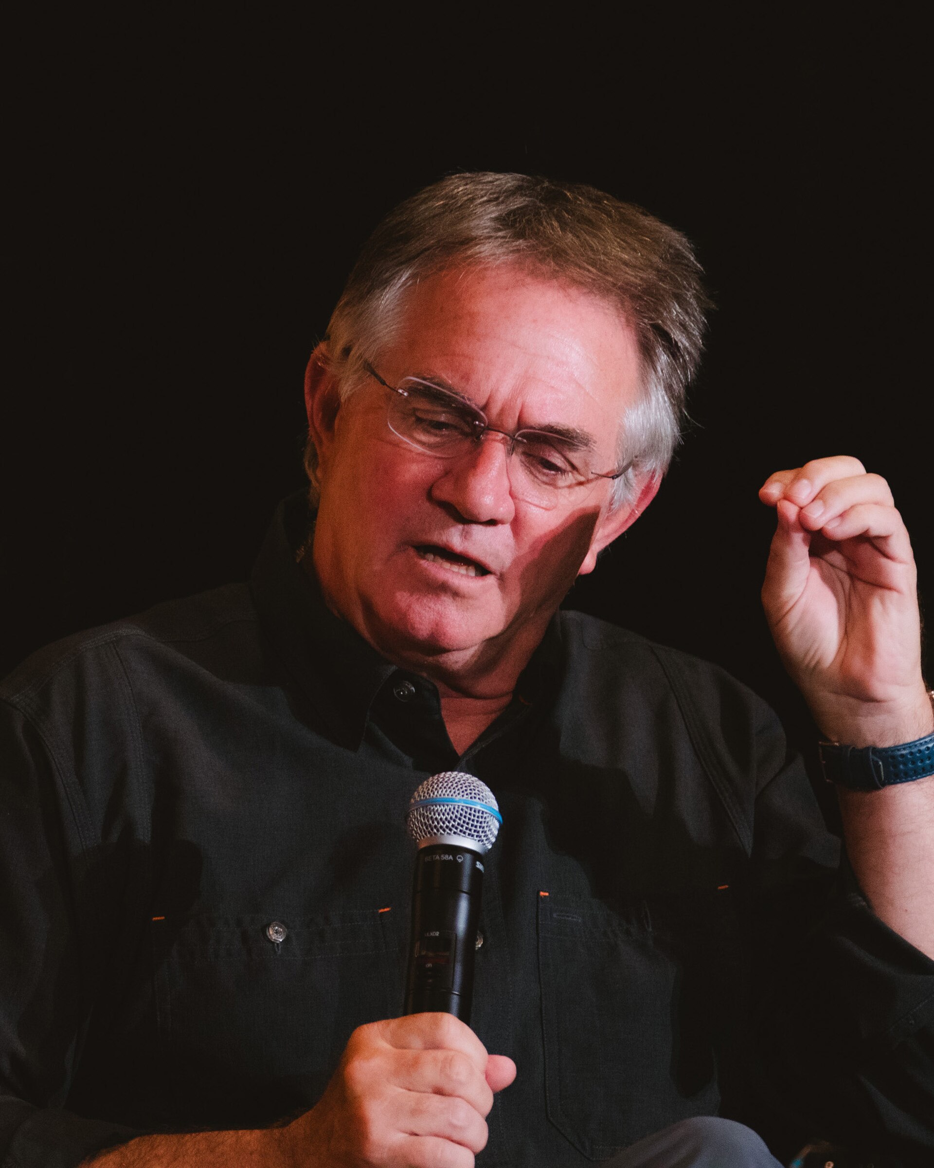 Hart Hanson speaking at the 20th anniversary panel for Bones at Televerse 2025 in Los Angeles, California.