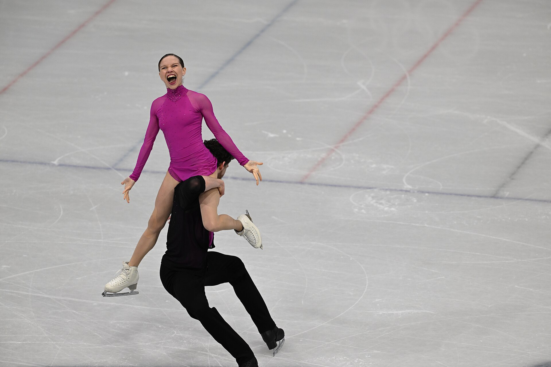 MILAN, ITALY - 15 FEBRUARY 2026: Ioulia Chtchetinina and Michal Wozniak of Poland compete during the Figure Skating Pair Skating Short Program at the Olympic Winter Games Milano Cortina 2026 Milano Ice Skating Arena on February 15, 2026 in Milan, Italy