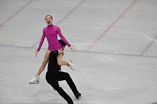 MILAN, ITALY - 15 FEBRUARY 2026: Ioulia Chtchetinina and Michal Wozniak of Poland compete during the Figure Skating Pair Skating Short Program at the Olympic Winter Games Milano Cortina 2026 Milano Ice Skating Arena on February 15, 2026 in Milan, Italy