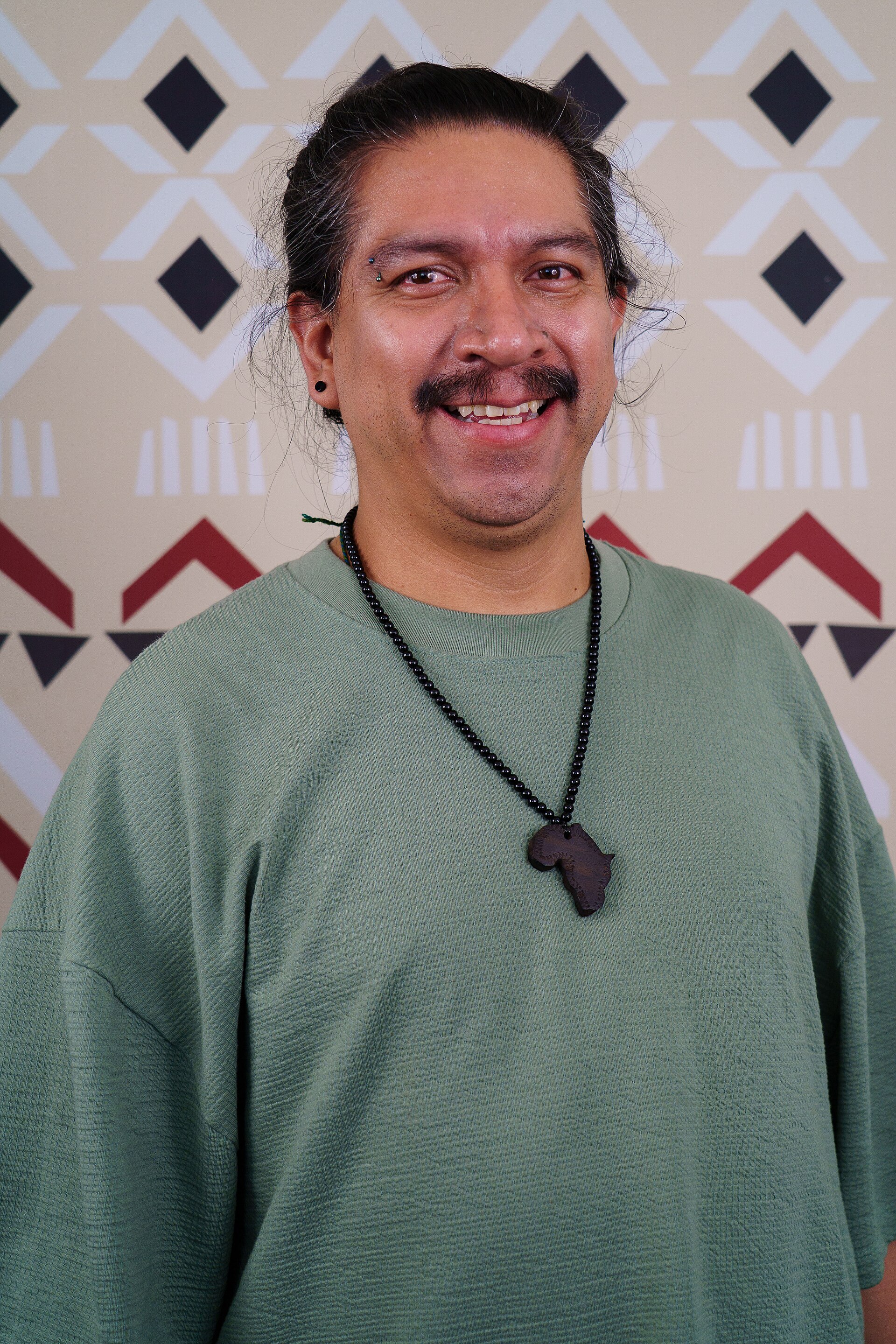 Iván Martínez portrait at Wikimania 2025 WikiPortraits Studio