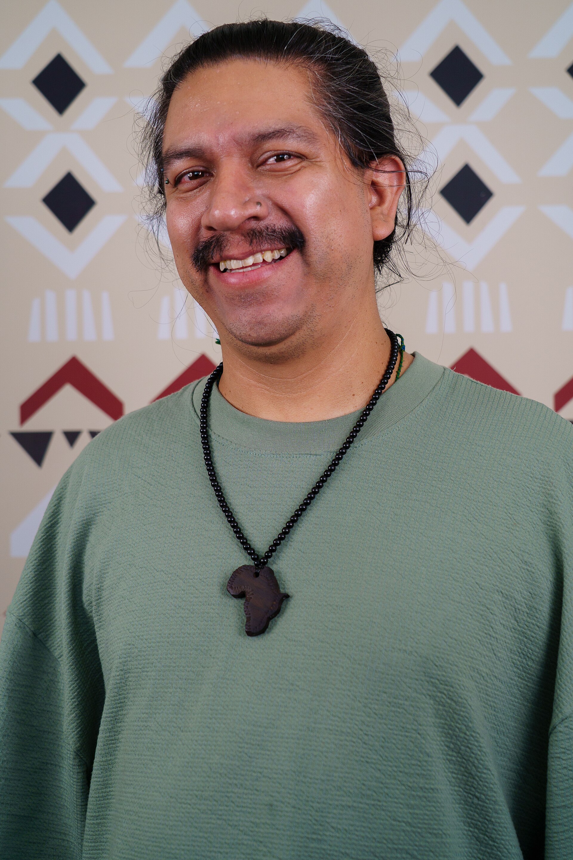 Iván Martínez portrait at Wikimania 2025 WikiPortraits Studio