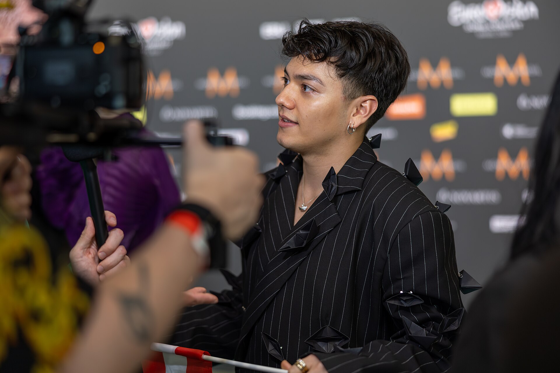 JJ, representing Austria, being interviewed at Eurovision 2025 in Basel, Switzerland.