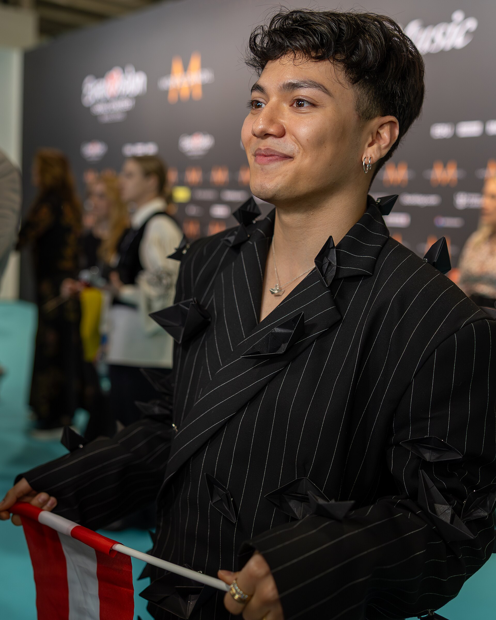 JJ, representing Austria, being interviewed at Eurovision 2025 in Basel, Switzerland.