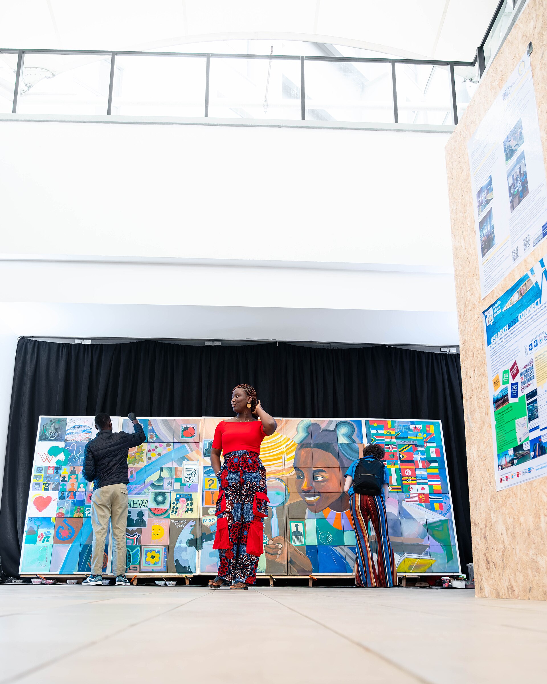 A Photo of Jael Boateng at Wikimania 2025 during the poster session
