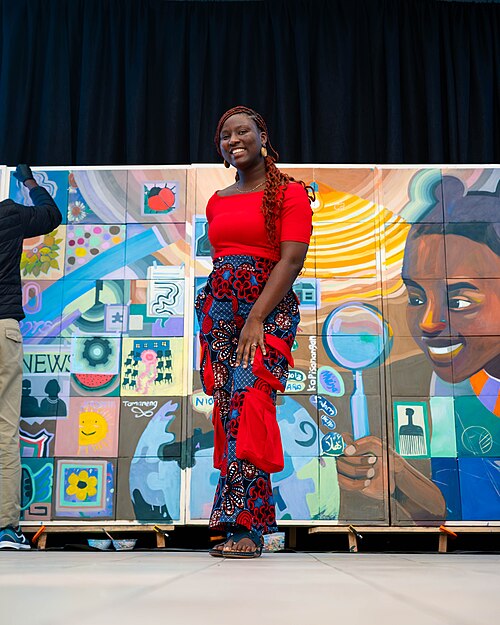 A Photo of Jael Boateng at Wikimania 2025 during the poster session