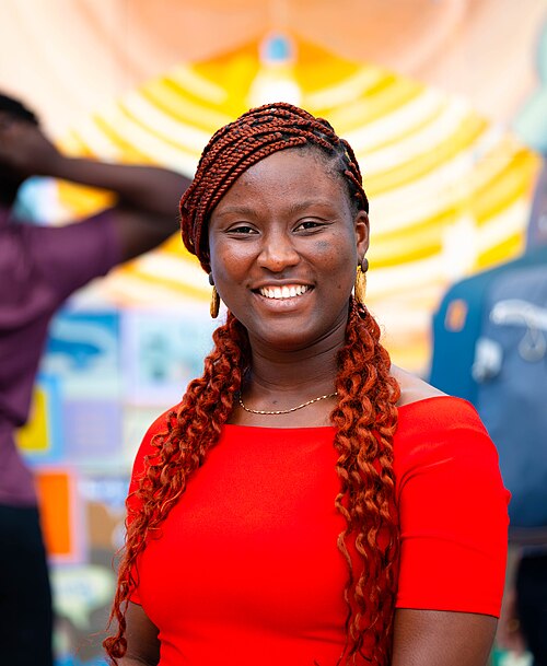 A Photo of Jael Boateng at Wikimania 2025 during the poster session