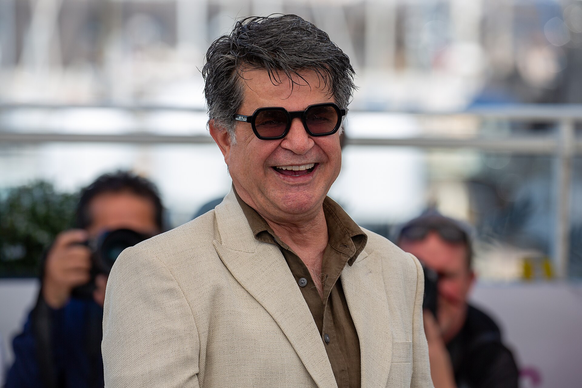 Jafar Panahi Laughing at 2025 Cannes Film Festival Photocall