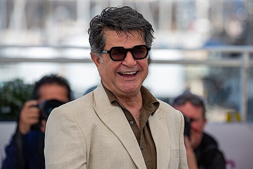 Jafar Panahi Laughing at 2025 Cannes Film Festival Photocall