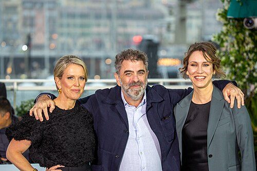 Jennifer Robinson, Eugene Jarecki, and Kathleen Fournier at 2025 Cannes The Six Billion Dollar Man Photocall
