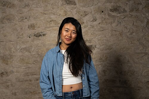 Jing Niu, Director, at the WikiPortraits studio at the 2025 SXSW Festival.