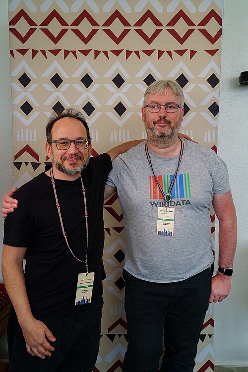 João Peschanski & Mike Peel portrait at Wikimania 2025 WikiPortraits Studio