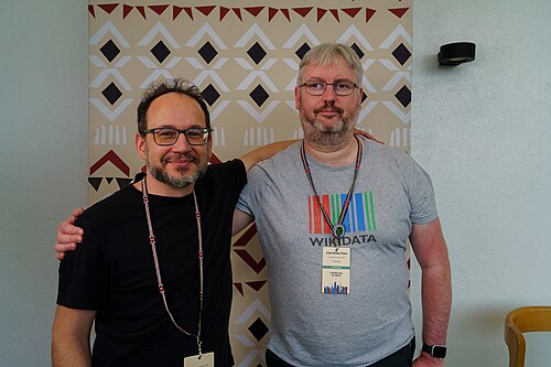 João Peschanski & Mike Peel portrait at Wikimania 2025 WikiPortraits Studio