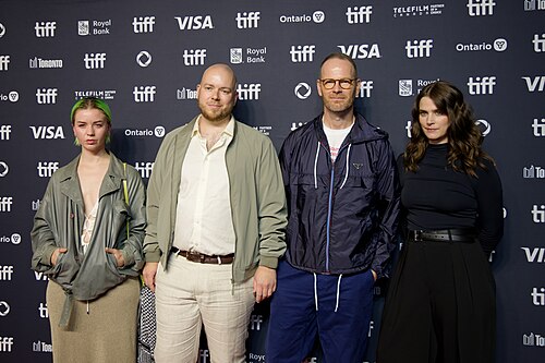 Joachim Trier, Inga Ibsdotter Lilleaas, and guests at the 2025 Toronto International Film Festival for Erupcja