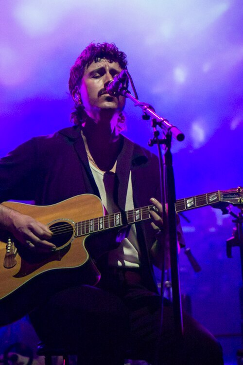 Joey Walker, guitarist for King Gizzard & The Lizard Wizard performing at a concert in 2023.