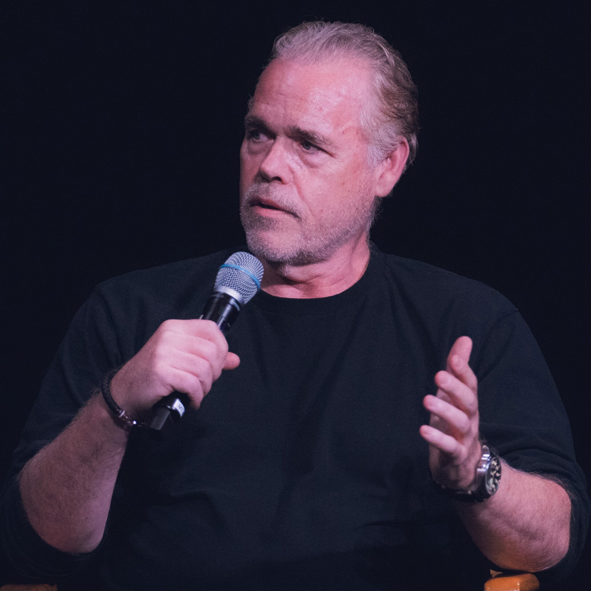 John Gilroy speaking at the Walt Disney Studios Main Theatre during a Q&A for Andor