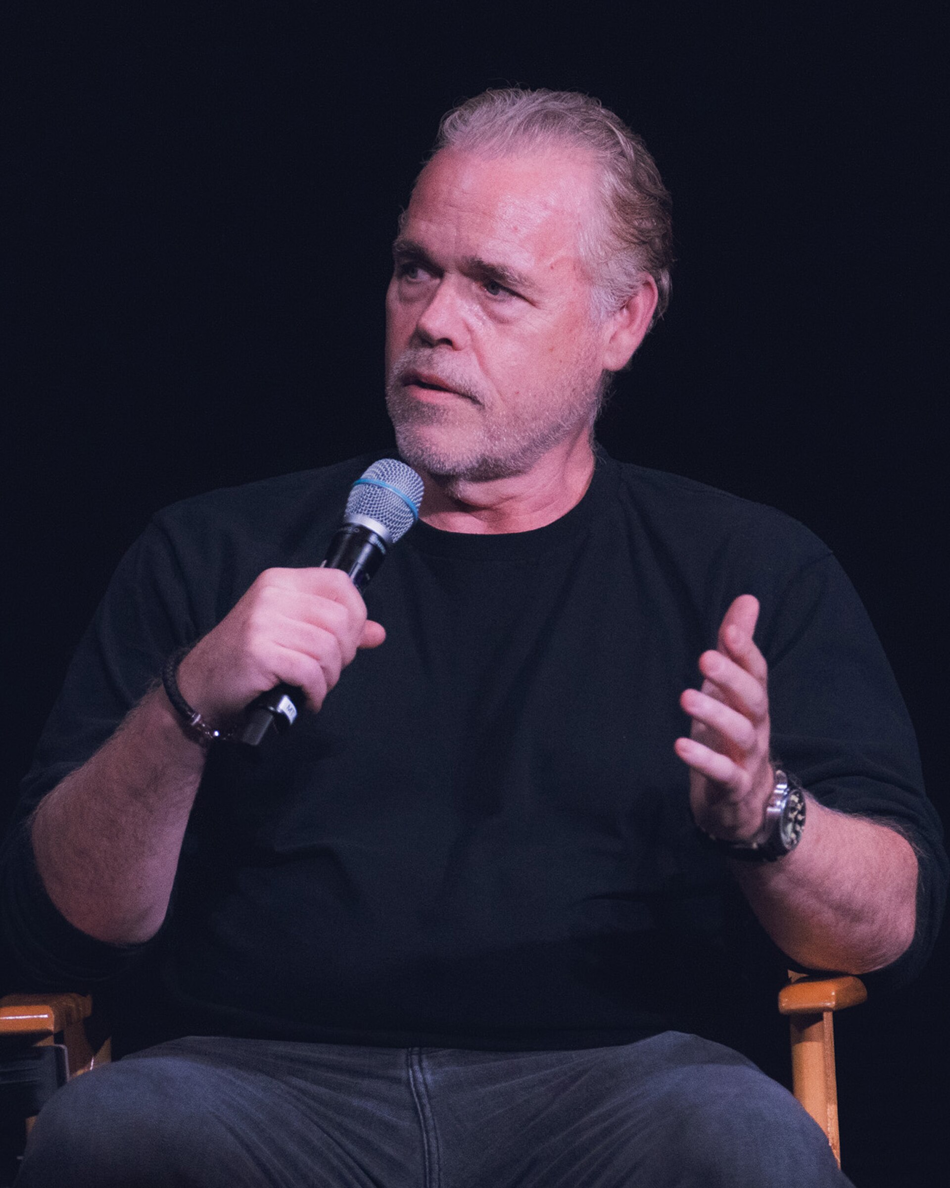 John Gilroy speaking at the Walt Disney Studios Main Theatre during a Q&A for Andor