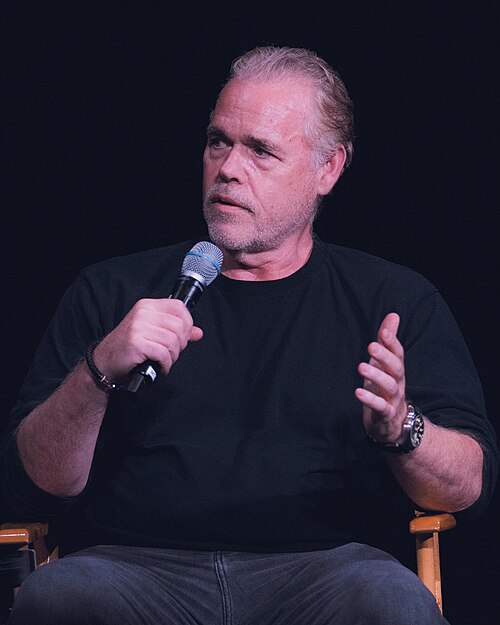 John Gilroy speaking at the Walt Disney Studios Main Theatre during a Q&A for Andor