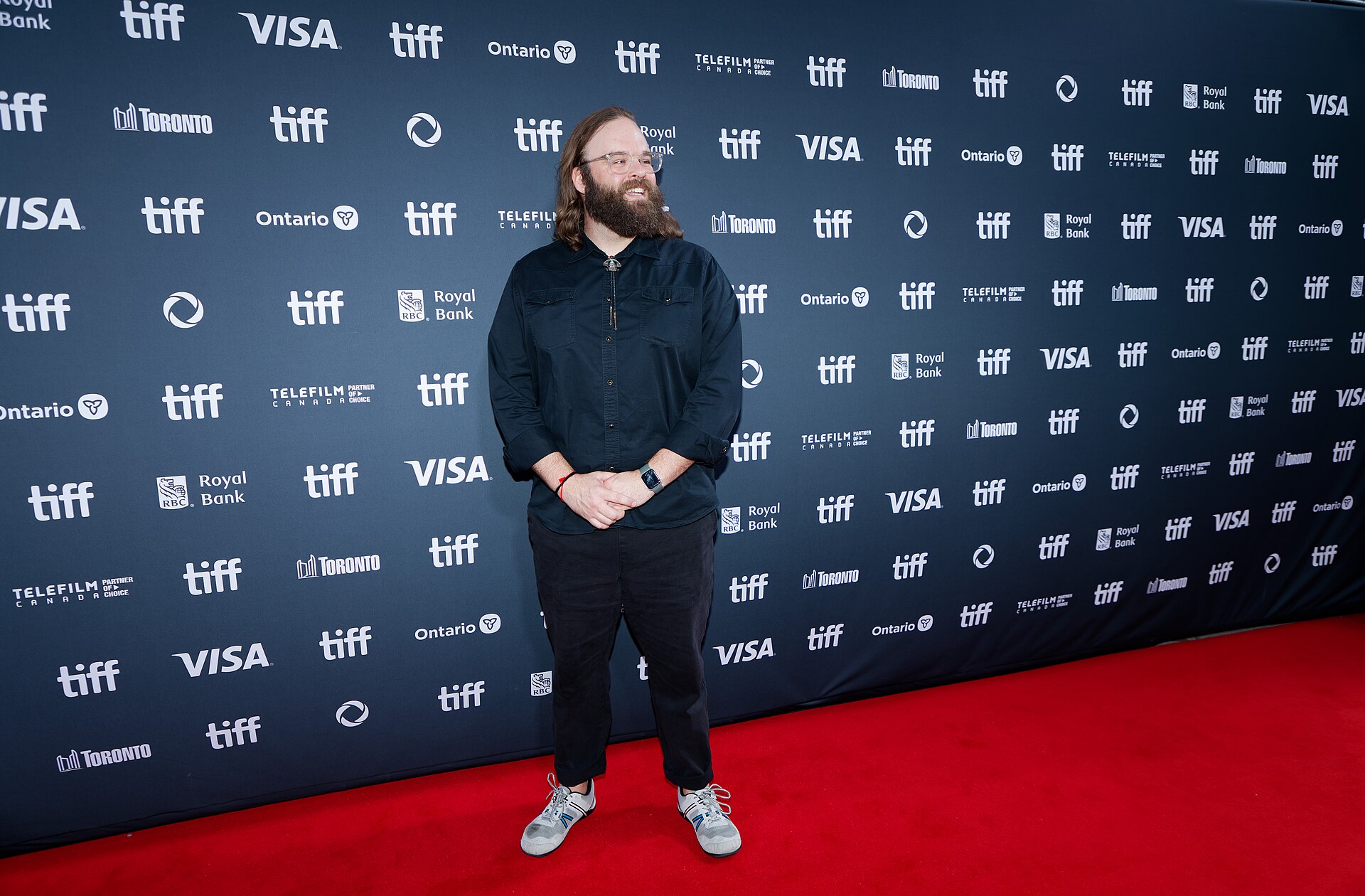 John Lang at the 2024 Toronto International Film Festival (TIFF) for the movie Takin' Care of Business.