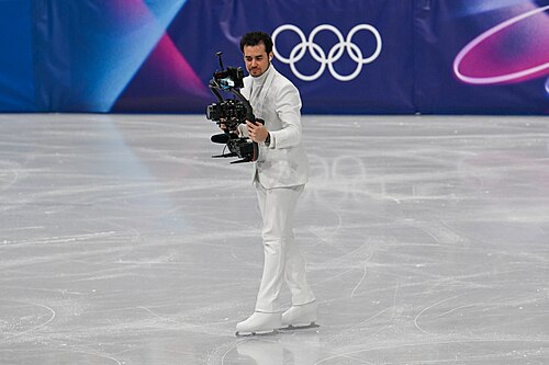 MILAN, ITALY - FEBRUARY 19: Camera man Jordan Cowan is live  during the Women's Single Skating on day thirteen of the Milano Cortina 2026 Winter Olympic games at Milano Ice Skating Arena on February 19, 2026 in Milan, Italy.