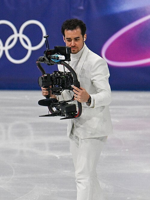 MILAN, ITALY - FEBRUARY 19: Camera man Jordan Cowan is live  during the Women's Single Skating on day thirteen of the Milano Cortina 2026 Winter Olympic games at Milano Ice Skating Arena on February 19, 2026 in Milan, Italy.