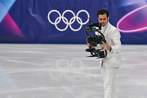 MILAN, ITALY - FEBRUARY 19: Camera man Jordan Cowan is live  during the Women's Single Skating on day thirteen of the Milano Cortina 2026 Winter Olympic games at Milano Ice Skating Arena on February 19, 2026 in Milan, Italy.