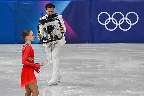 MILAN, ITALY - FEBRUARY 19: Camera man Jordan Cowan is live  during the Women's Single Skating on day thirteen of the Milano Cortina 2026 Winter Olympic games at Milano Ice Skating Arena on February 19, 2026 in Milan, Italy.