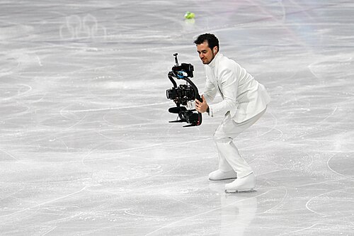 MILAN, ITALY - FEBRUARY 19: Camera man Jordan Cowan is live  during the Women's Single Skating on day thirteen of the Milano Cortina 2026 Winter Olympic games at Milano Ice Skating Arena on February 19, 2026 in Milan, Italy.