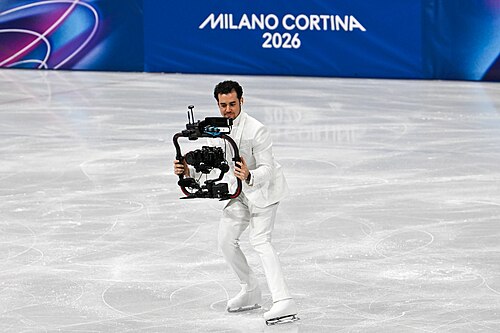 MILAN, ITALY - FEBRUARY 19: Camera man Jordan Cowan is live  during the Women's Single Skating on day thirteen of the Milano Cortina 2026 Winter Olympic games at Milano Ice Skating Arena on February 19, 2026 in Milan, Italy.