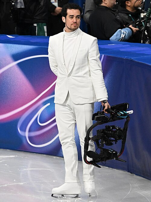MILAN, ITALY - FEBRUARY 19: Camera man Jordan Cowan is live  during the Women's Single Skating on day thirteen of the Milano Cortina 2026 Winter Olympic games at Milano Ice Skating Arena on February 19, 2026 in Milan, Italy.