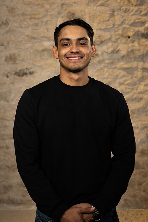 Juan Davila, paralegal, at the WikiPortraits studio at the 2025 SXSW Festival.