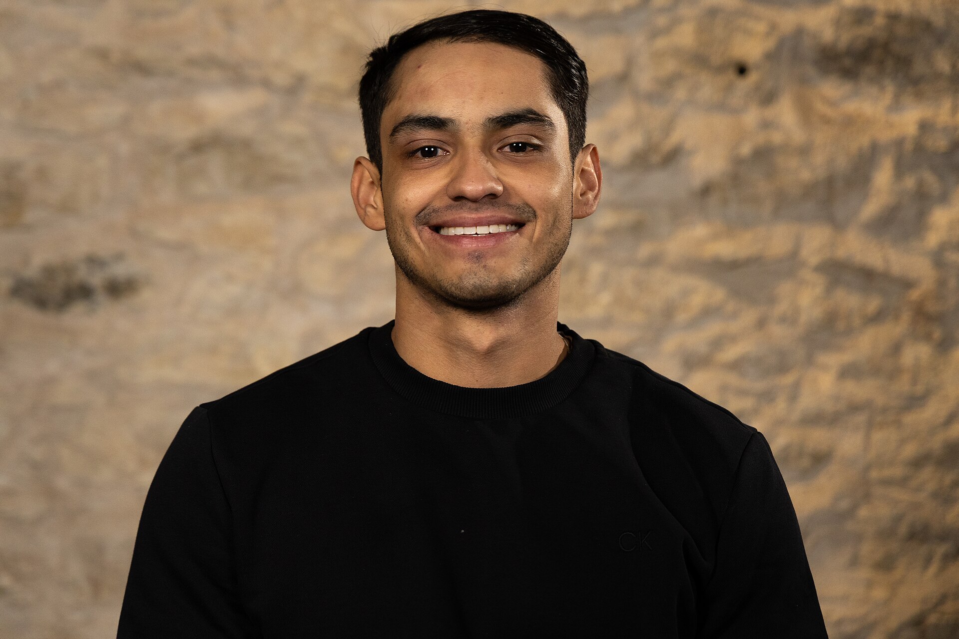 Juan Davila, paralegal, at the WikiPortraits studio at the 2025 SXSW Festival.