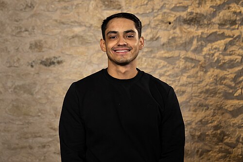 Juan Davila, paralegal, at the WikiPortraits studio at the 2025 SXSW Festival.