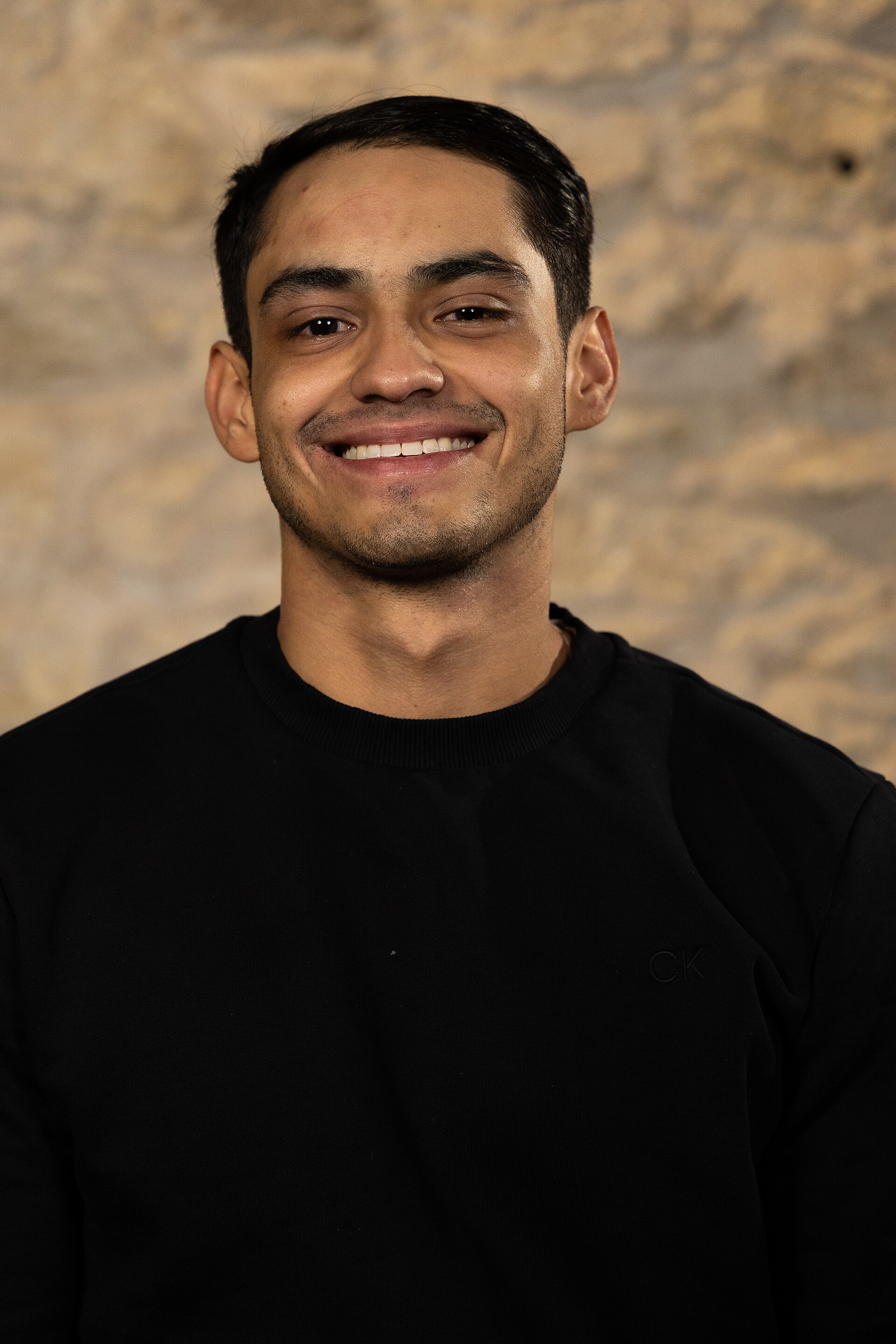 Juan Davila, paralegal, at the WikiPortraits studio at the 2025 SXSW Festival.