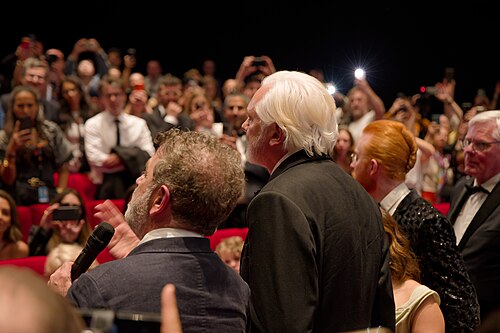 Julian Assange in the audience after the premiere of The Six Billion Dollar Man at the 2025 Cannes Film Festival