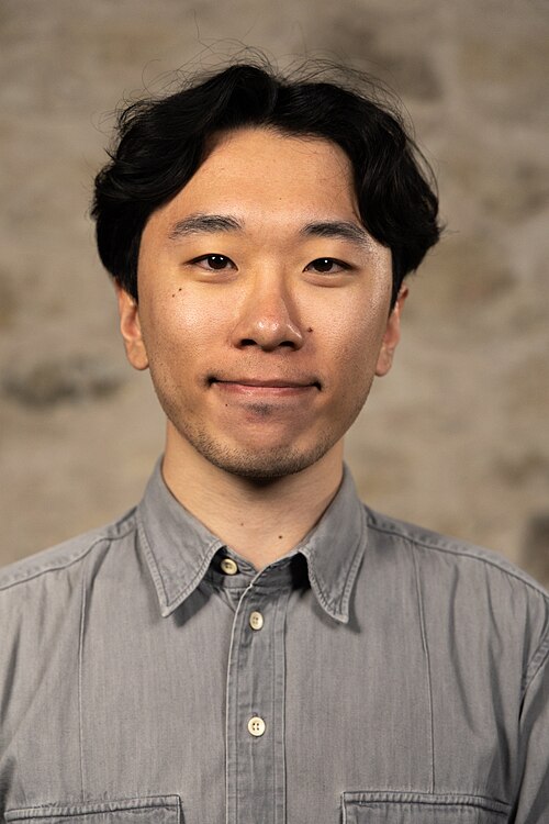 Justin Chong, Product Designer, at the WikiPortraits studio at the 2025 SXSW Festival.