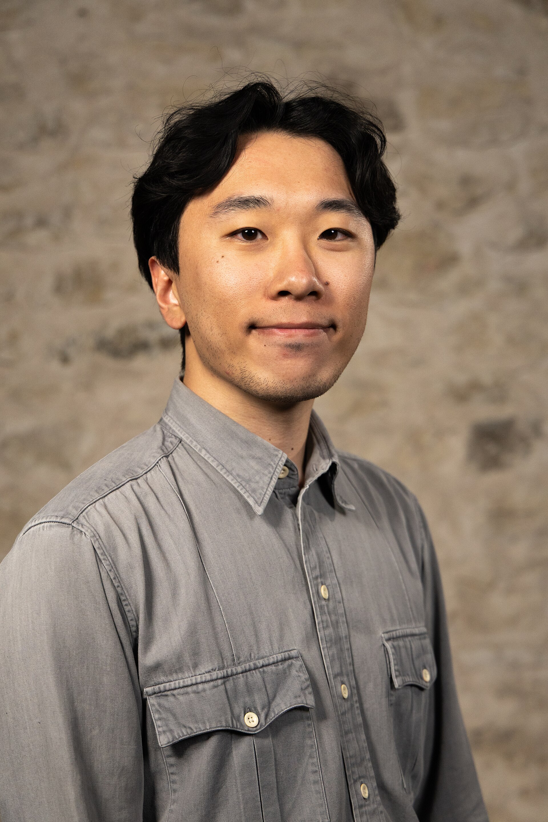 Justin Chong, Product Designer, at the WikiPortraits studio at the 2025 SXSW Festival.