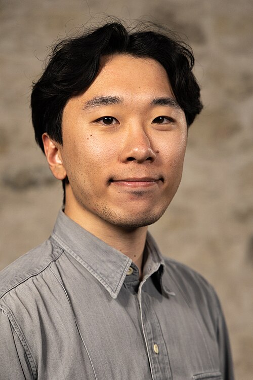 Justin Chong, Product Designer, at the WikiPortraits studio at the 2025 SXSW Festival.