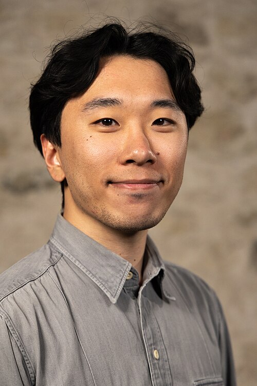 Justin Chong, Product Designer, at the WikiPortraits studio at the 2025 SXSW Festival.