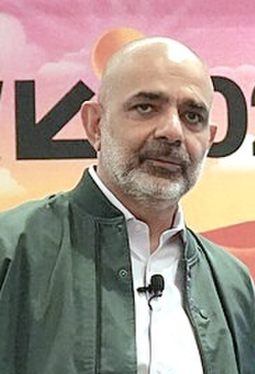 Karim Lakhani, Jennifer Stave, Shikhar Ghosh (l-r) panel at SXSW 2025 in Austin, Texas. Our AI-Driven World: A Utopian Dream or Dystopian Nightmare?.