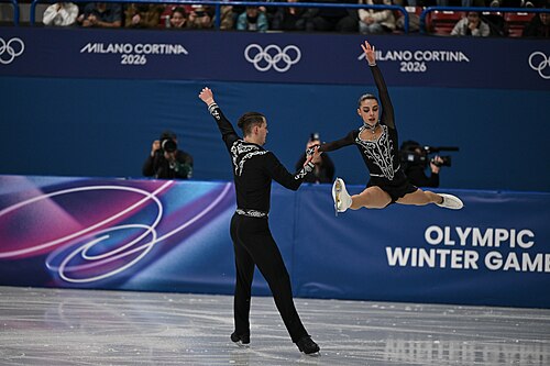 MILAN, ITALY - 15 FEBRUARY 2026: Karina Akopova and Nikita Rakhmanin of Armenia compete during the Figure Skating Pair Skating Short Program at the Olympic Winter Games Milano Cortina 2026  Milano Ice Skating Arena on February 15, 2026 in Milan, Italy