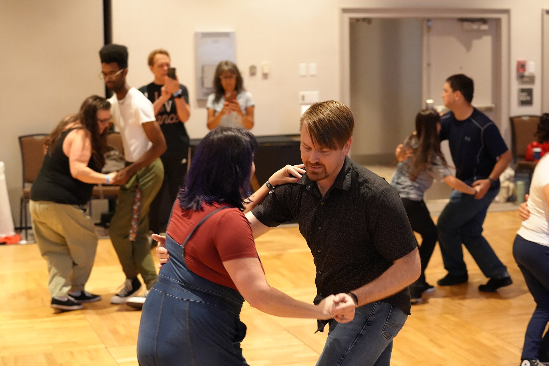 Kelli Wilkerson-Chastain & Harrison Furmidge, dancers & instructors, at California Dance Festival 2025 in Sacramento, California at a class called Lindy Hop.