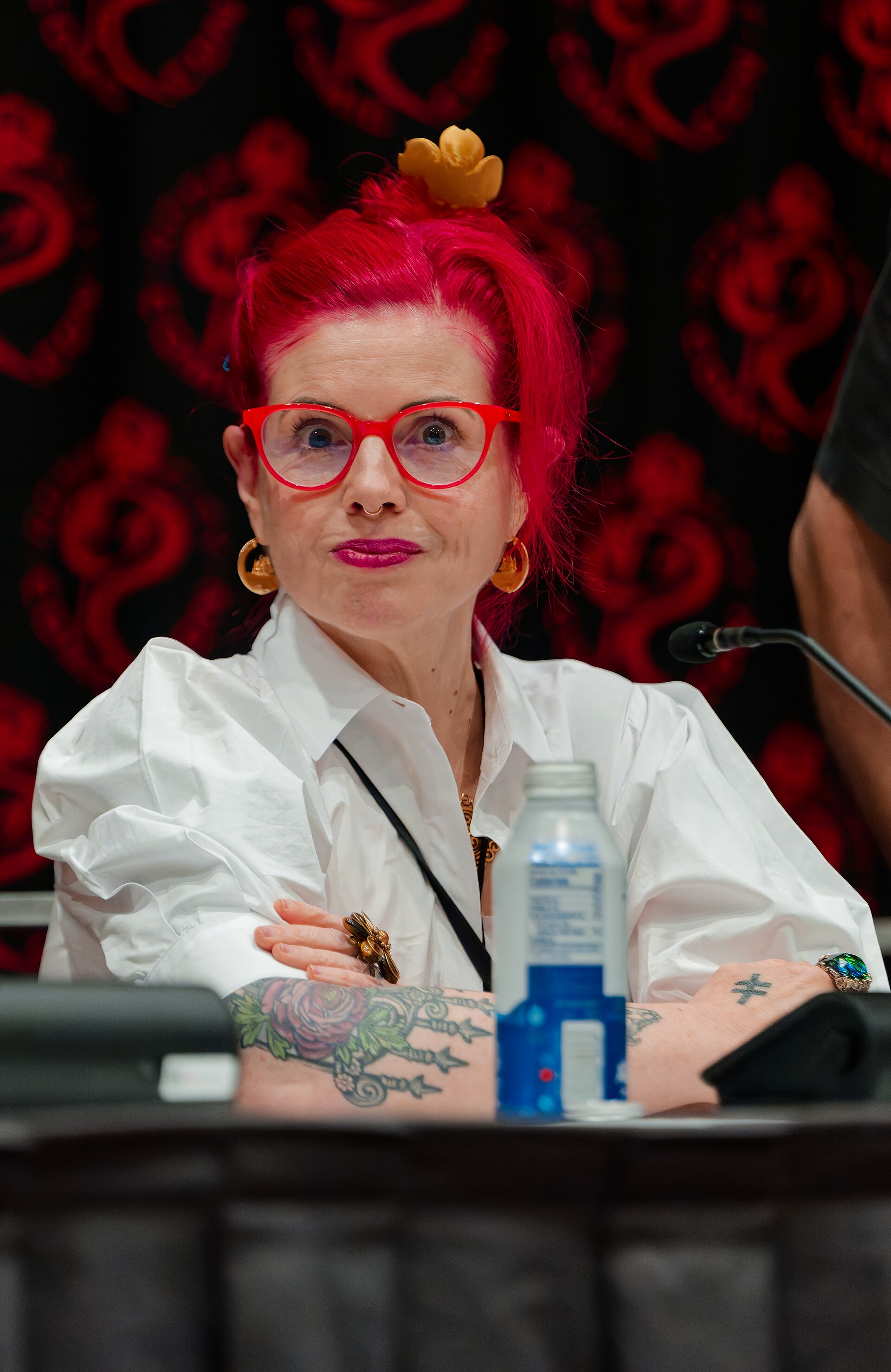 Kelly Sue DeConnick speaking on a panel at Rose City Comic Con