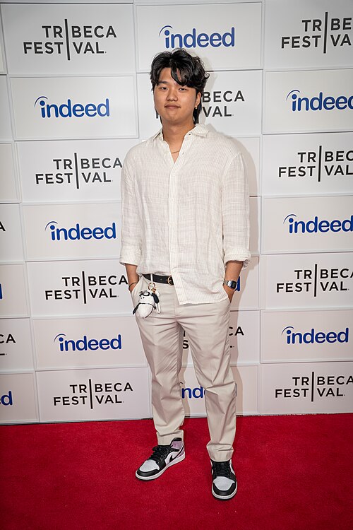 Kevin Jin Kwan Kim, writer & director, at a 2025 Tribeca Film Festival red carpet in New York City for the film My Dad, the Rockstar.