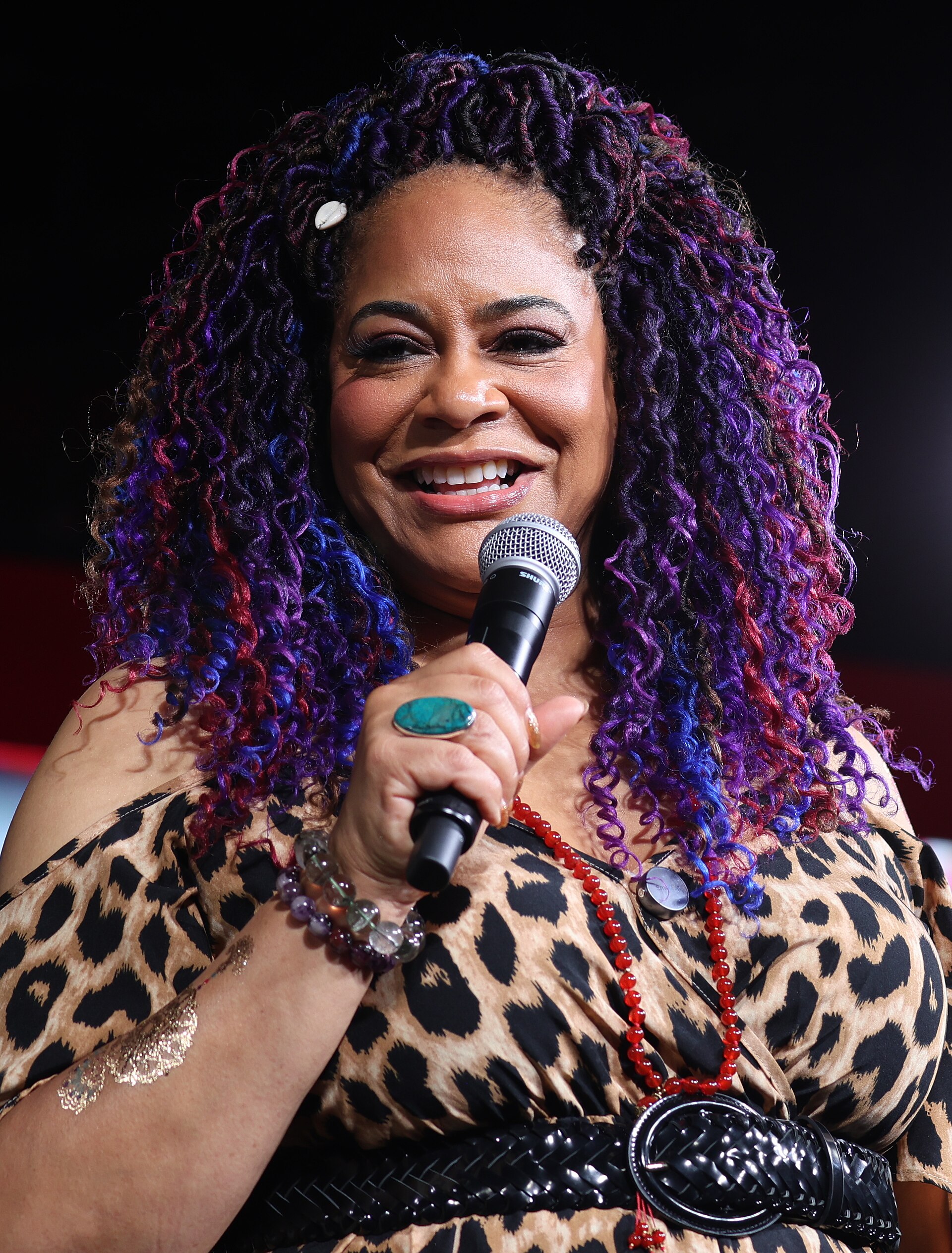 Kim Coles smiles on the main stage during a Q&A at Essence Fest 2025