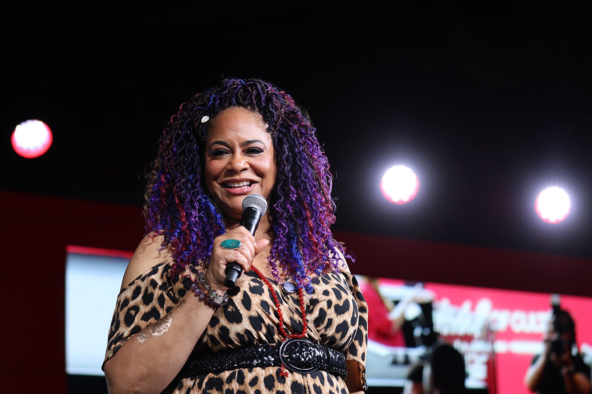 Kim Coles smiles on the main stage during a Q&A at Essence Fest 2025