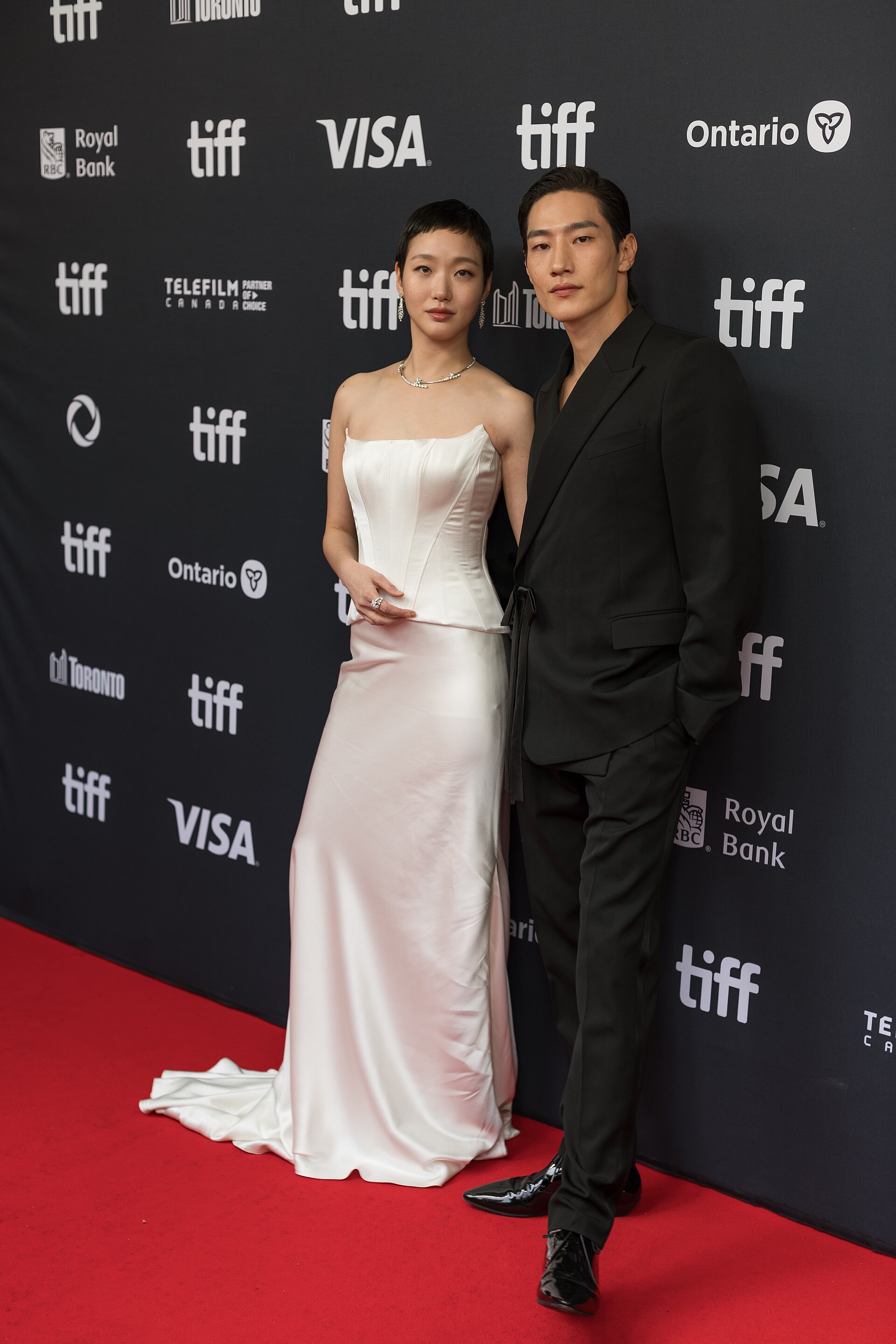 Kim Go-eun and Steve Sanghyun Noh at the 2024 Toronto International Film Festival red carpet for the film 'Love in the Big City'