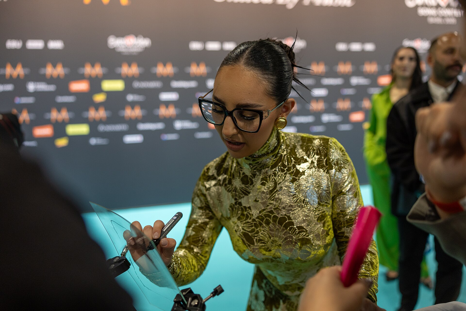 Klavdia, representing Greece, being interviewed at Eurovision 2025 in Basel, Switzerland.