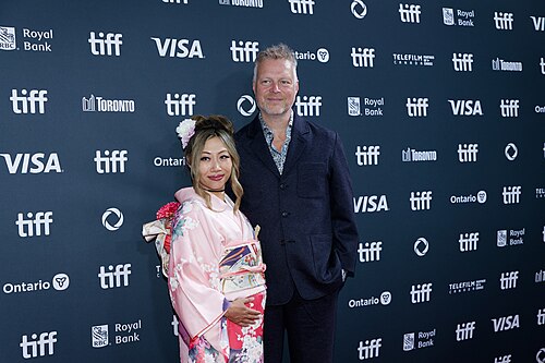 KoKo Bachman and Tal Bachman at the 2024 Toronto International Film Festival (TIFF) for the movie Takin' Care of Business.