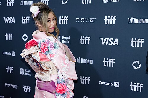 KoKo Bachman at the 2024 Toronto International Film Festival (TIFF) for the movie Takin' Care of Business.